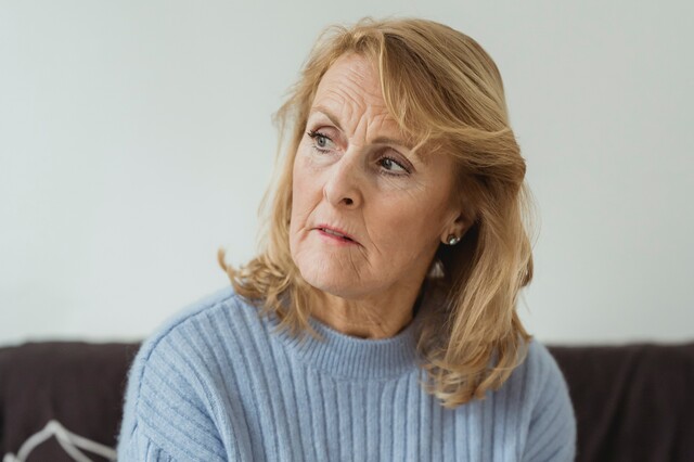 Mum looking into distance thinking